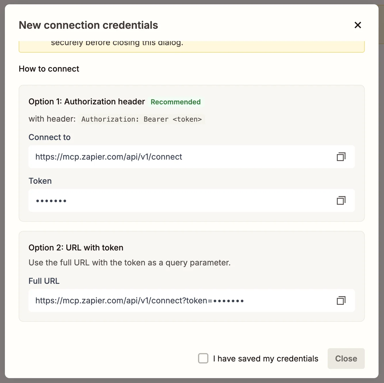 Zapier MCP credentials dialog showing the server URL and bearer token